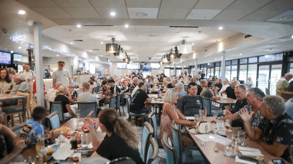 Patrons enjoying a meal and drinks at Grandviews Bowls Club Peakhurst